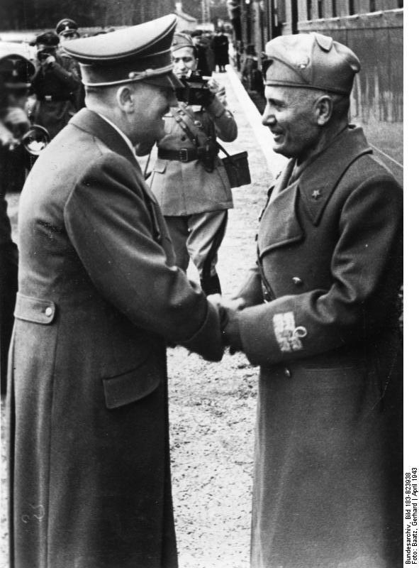 Adolf Hitler greets Benito Mussolini at his arrival in Kleßheim station